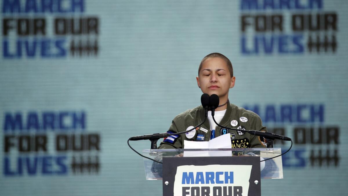 Parkland shooting survivor Emma Gonzalez stands silently and cries at the podium of the "March for Our Lives" rally in Washington on March 24.