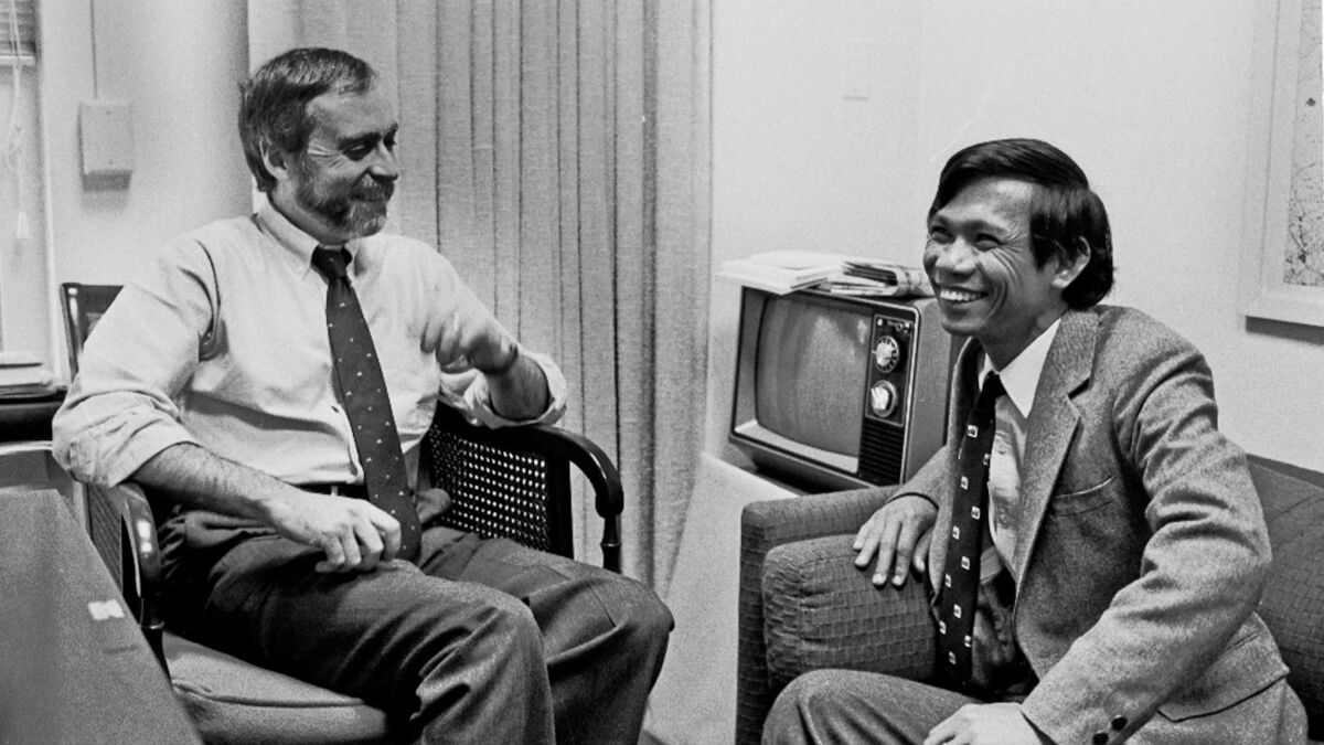 Sydney Schanberg, left, with Dith Pran at the New York Times office in 1980.