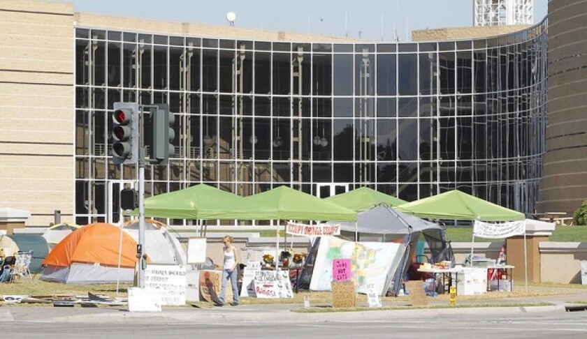 Irvine City Council voted to allow Occupy OC/Irvine demonstrators to sleep on the Civic Center lawn at the corner of Anton and Harvard.