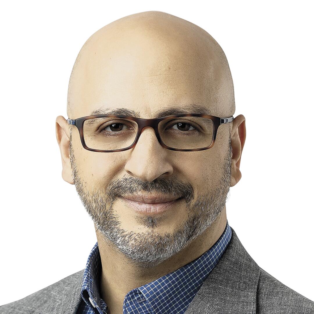 Nominee: Ali Firoozi - Los Angeles Times