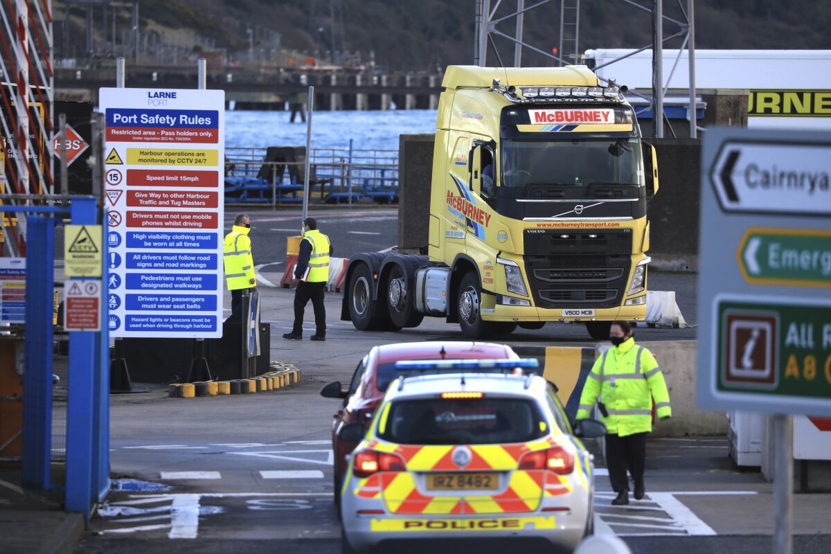 Customs officials check vehicles at a ferry terminal in Northern Ireland as part of new post-Brexit requirements.