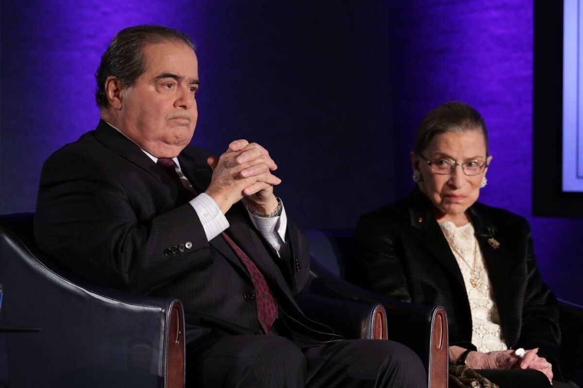 Supreme Court Justices Antonin Scalia and Ruth Bader Ginsburg at the National Press Club in 2014.