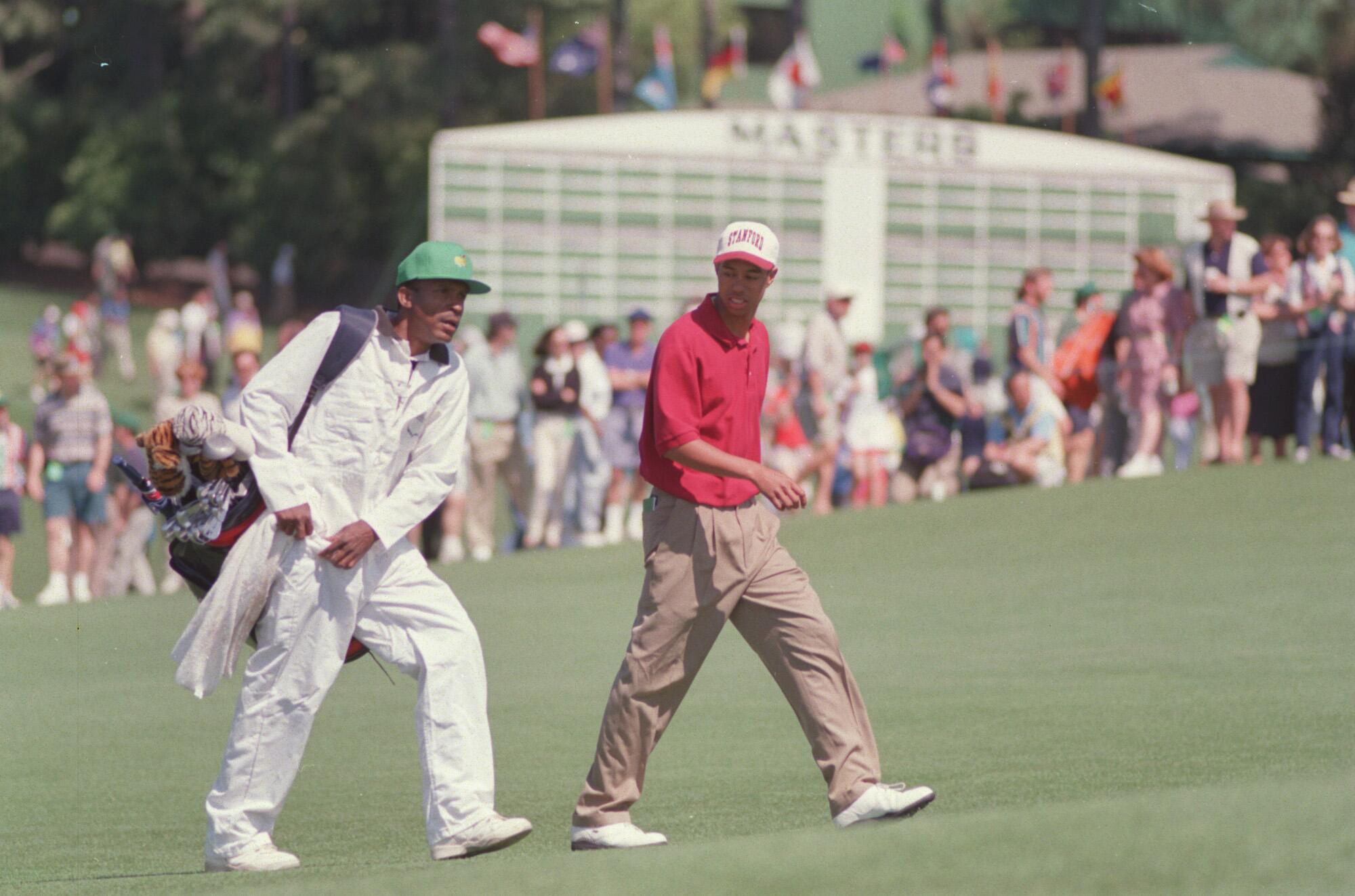 Tiger Woods and caddie Tommy Bennett in 1995.