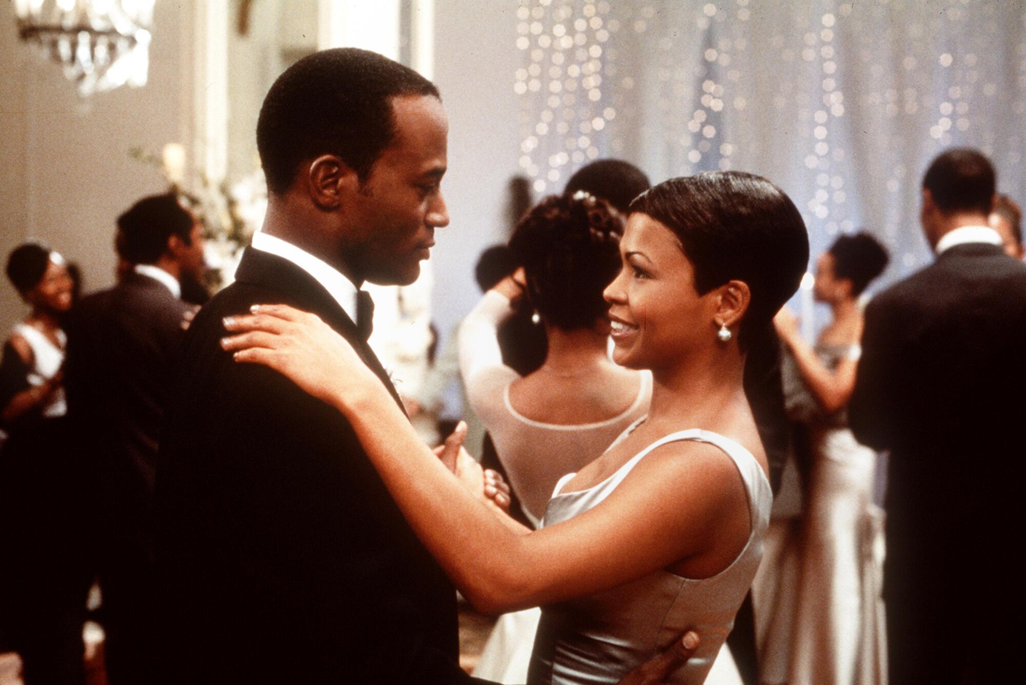 Taye Diggs y Nia Long en "El padrino."