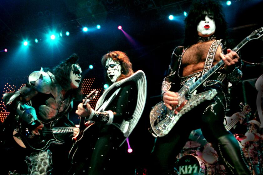 Glenn Koenig –– – (left to right) Members of the rock band KISS, Gene Simmons,Ace Frehley, and Paul Stanley as the band performed at the Pond.