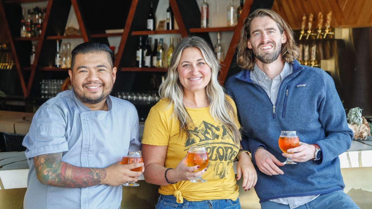 The engine that drives Bivouac Ciderworks in North Park: executive chef Danilo "DJ" Tangalin and co-founders Lara Worm and Matthew Austin. The restaurant and cidery will celebrate its first-year anniversary in January.
