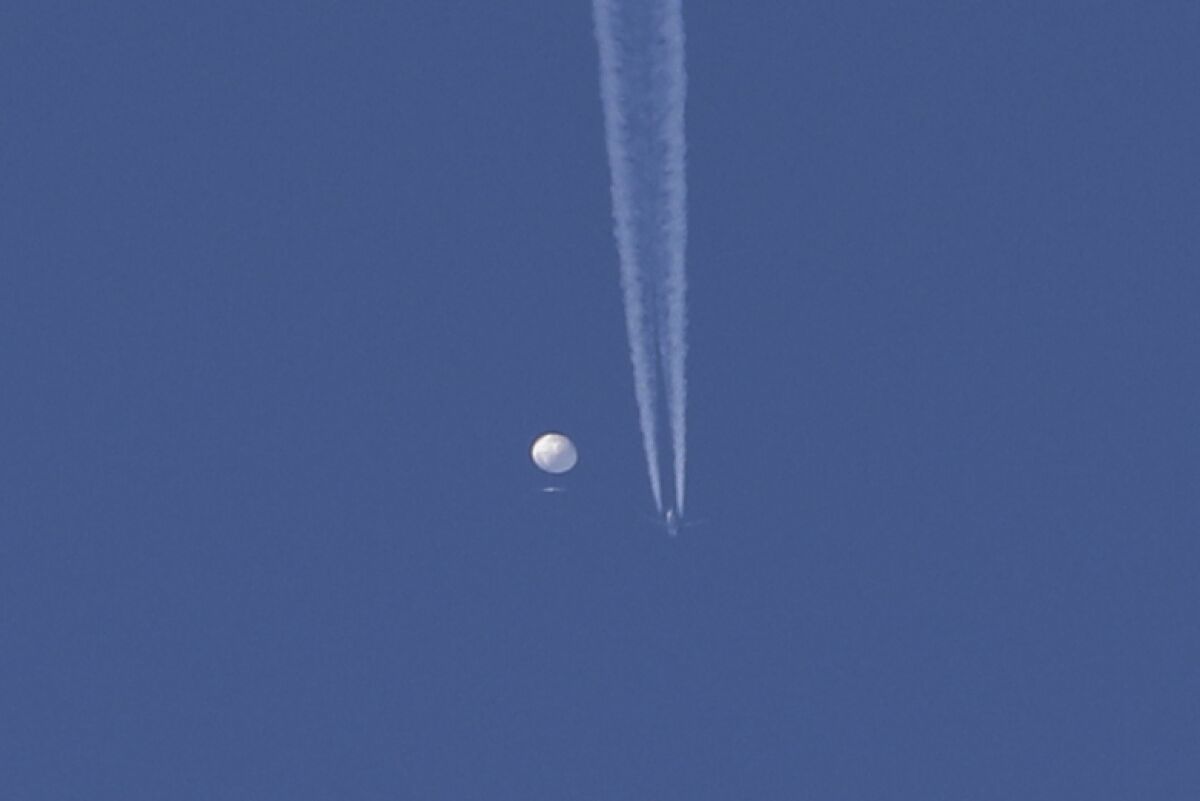 U.S. downs Chinese balloon over ocean, moves to recover debris - Los Angeles Times