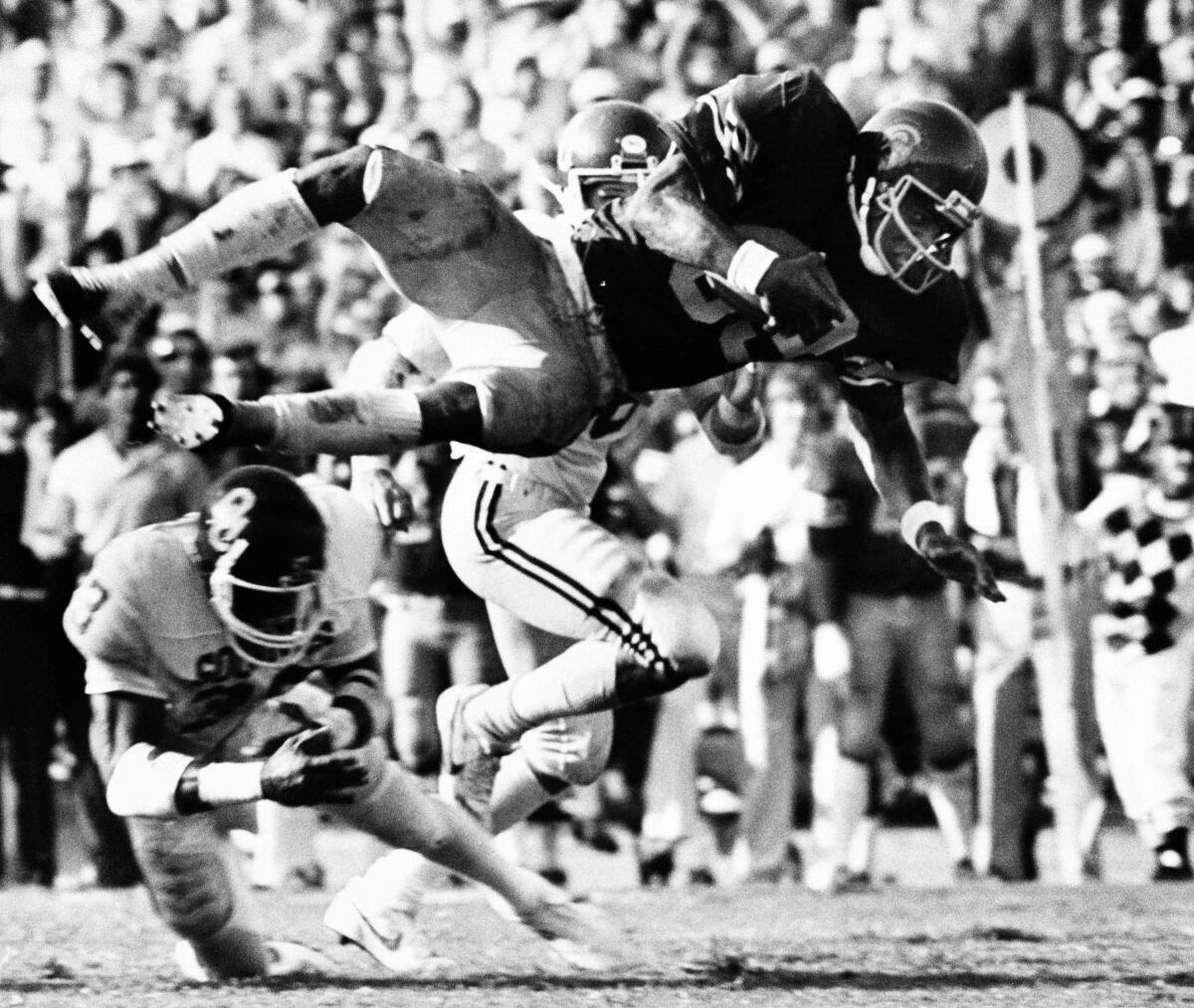 USC's Marcus Allen carries the ball against Oklahoma during a game in September 1981.
