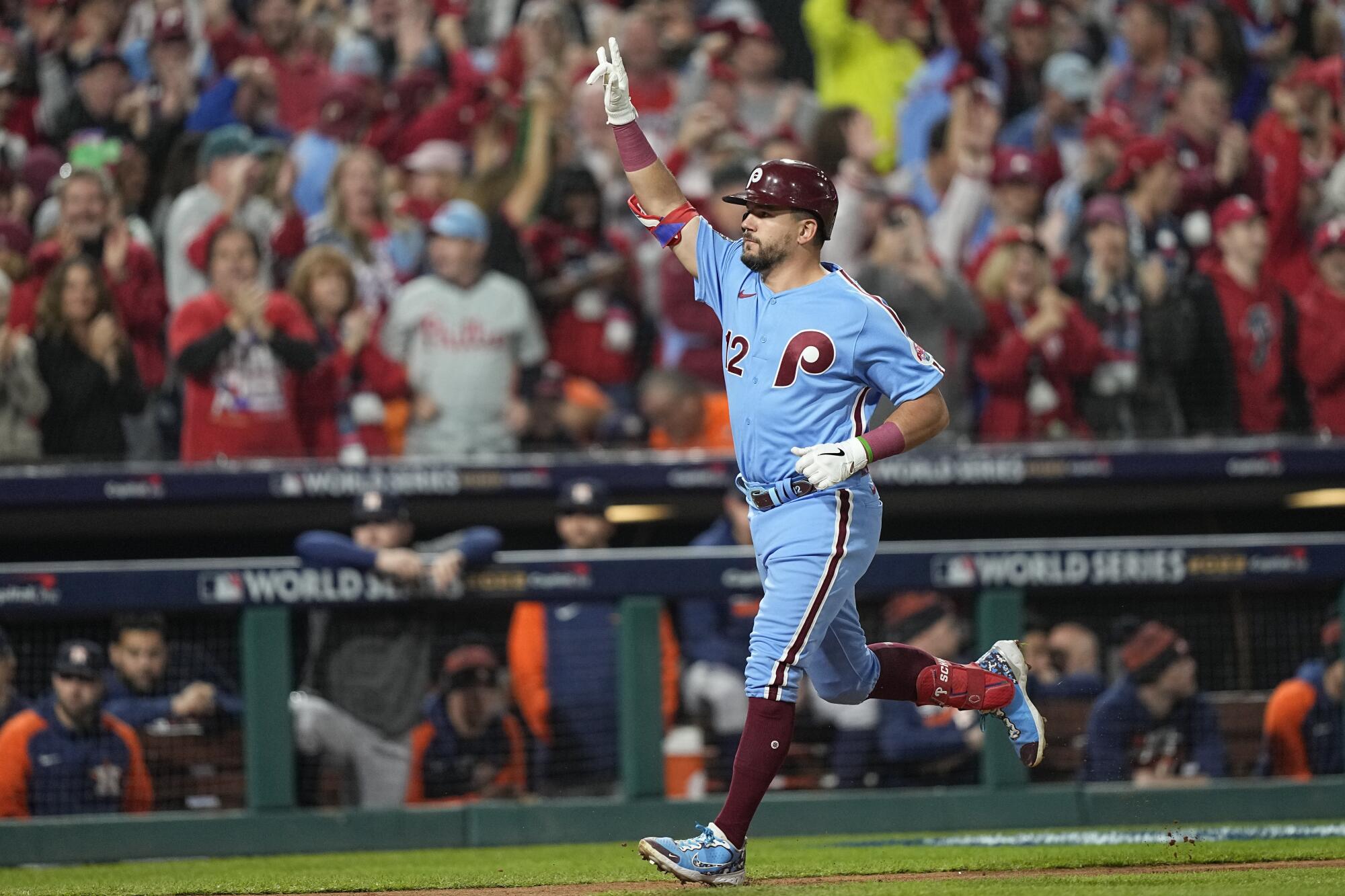 Philadelphia's Kyle Schwarber celebrates after hitting a home run in Game 5 of the World Series.