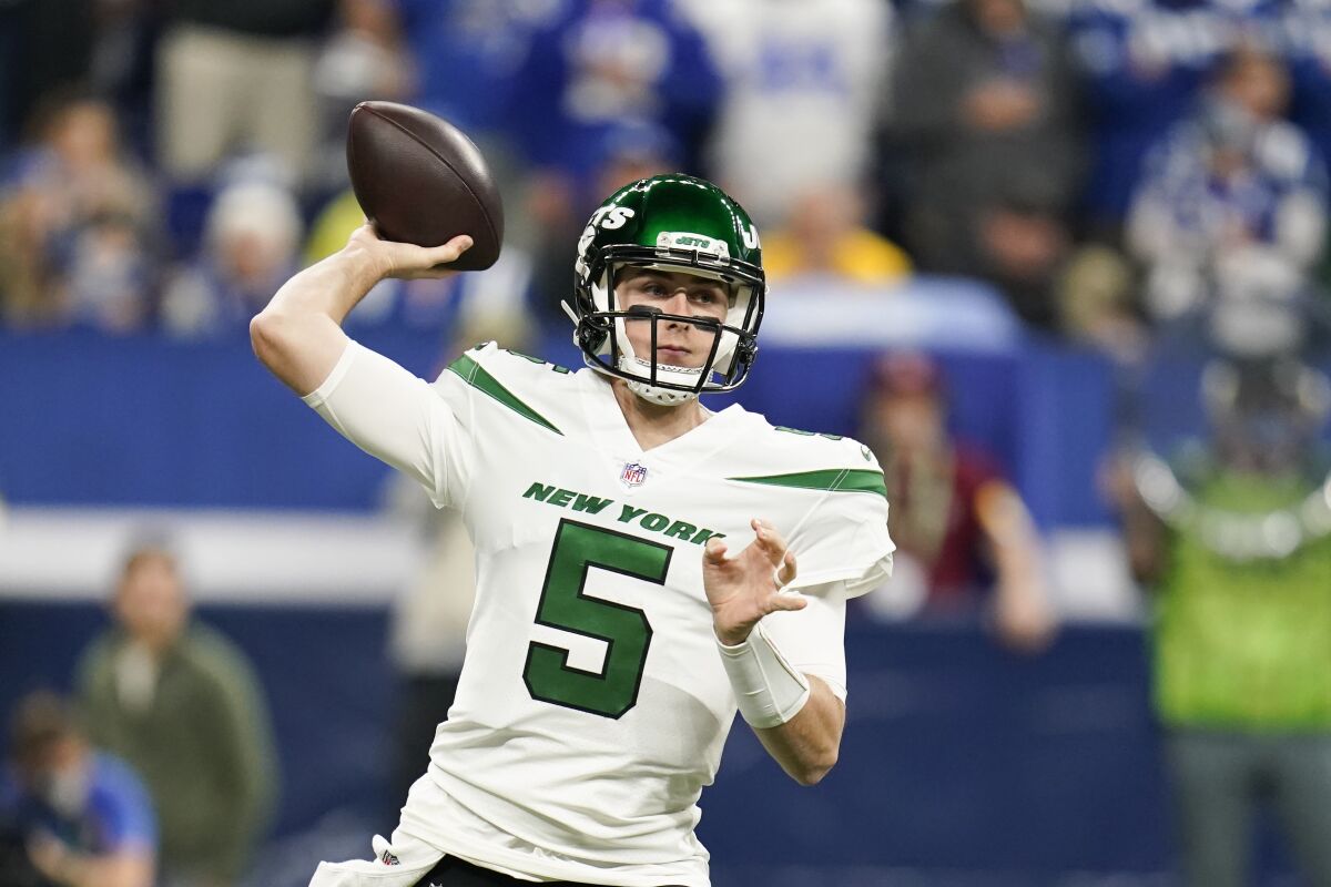 New York Jets quarterback Mike White (5) throws during the first half of an NFL football game against the Indianapolis Colts, Thursday, Nov. 4, 2021, in Indianapolis. (AP Photo/Michael Conroy)