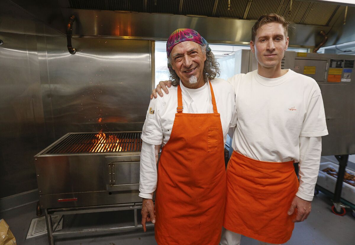 Owner Ivan Calderon and his son, Nico at the new Taco Mesita in Tustin.