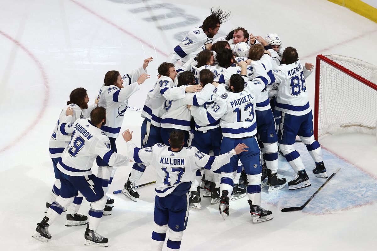 The Tampa Bay Lightning celebrate their series-clinching 2-0 win over the Dallas Stars in Game 6 of the Stanley Cup Final.
