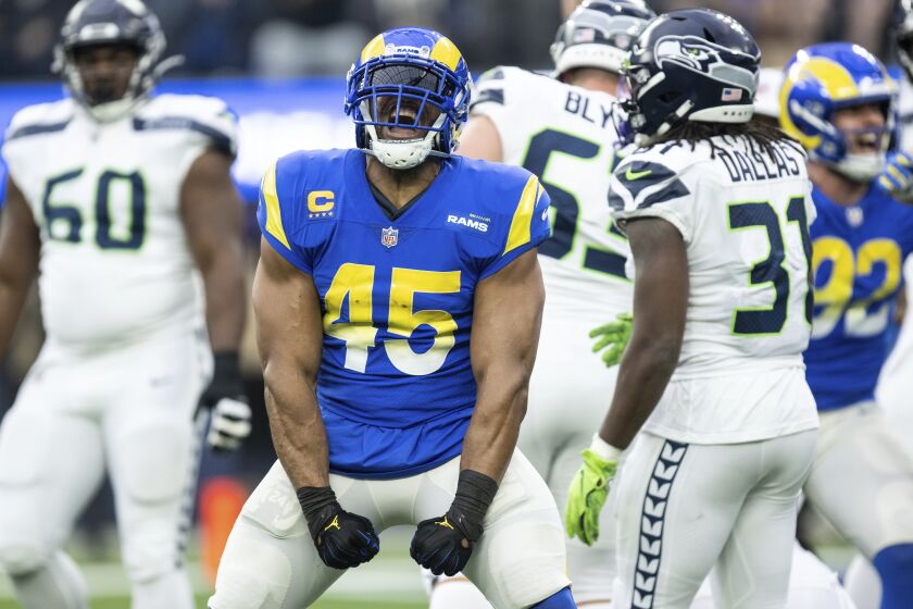Los Angeles Rams linebacker Bobby Wagner (45) reacts on his sack during an NFL football game.