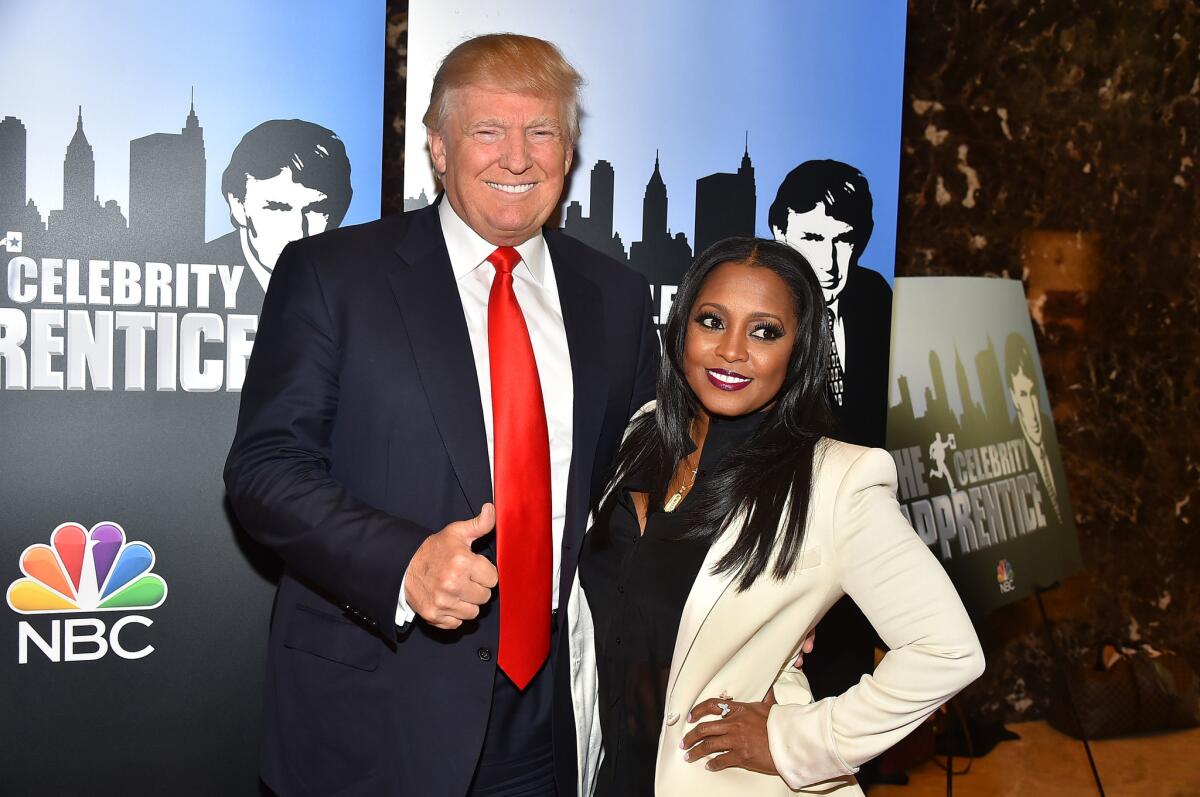 Donald Trump and Keisha Knight Pulliam attend the "Celebrity Apprentice" Red Carpet Event at Trump Tower on Jan. 5, 2015, in New York City.