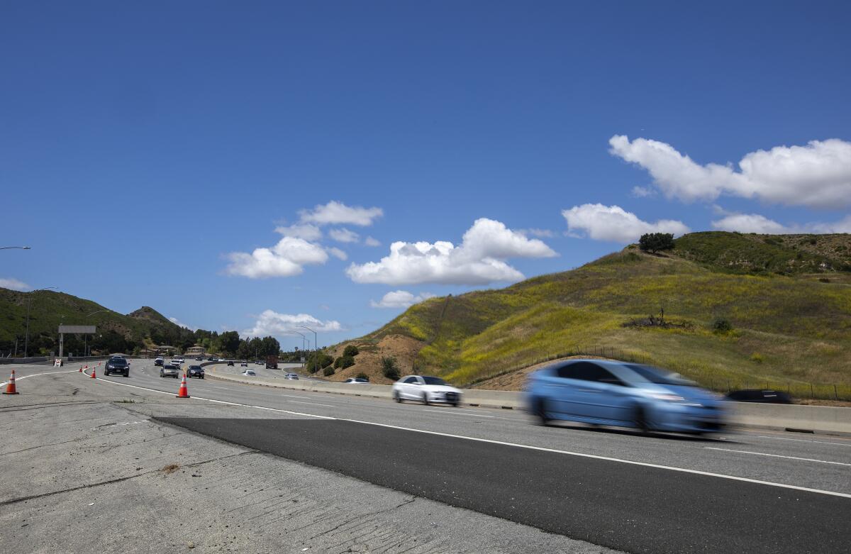 Cars travel south on the 101 freeway north of the Liberty Canyon offramp in
