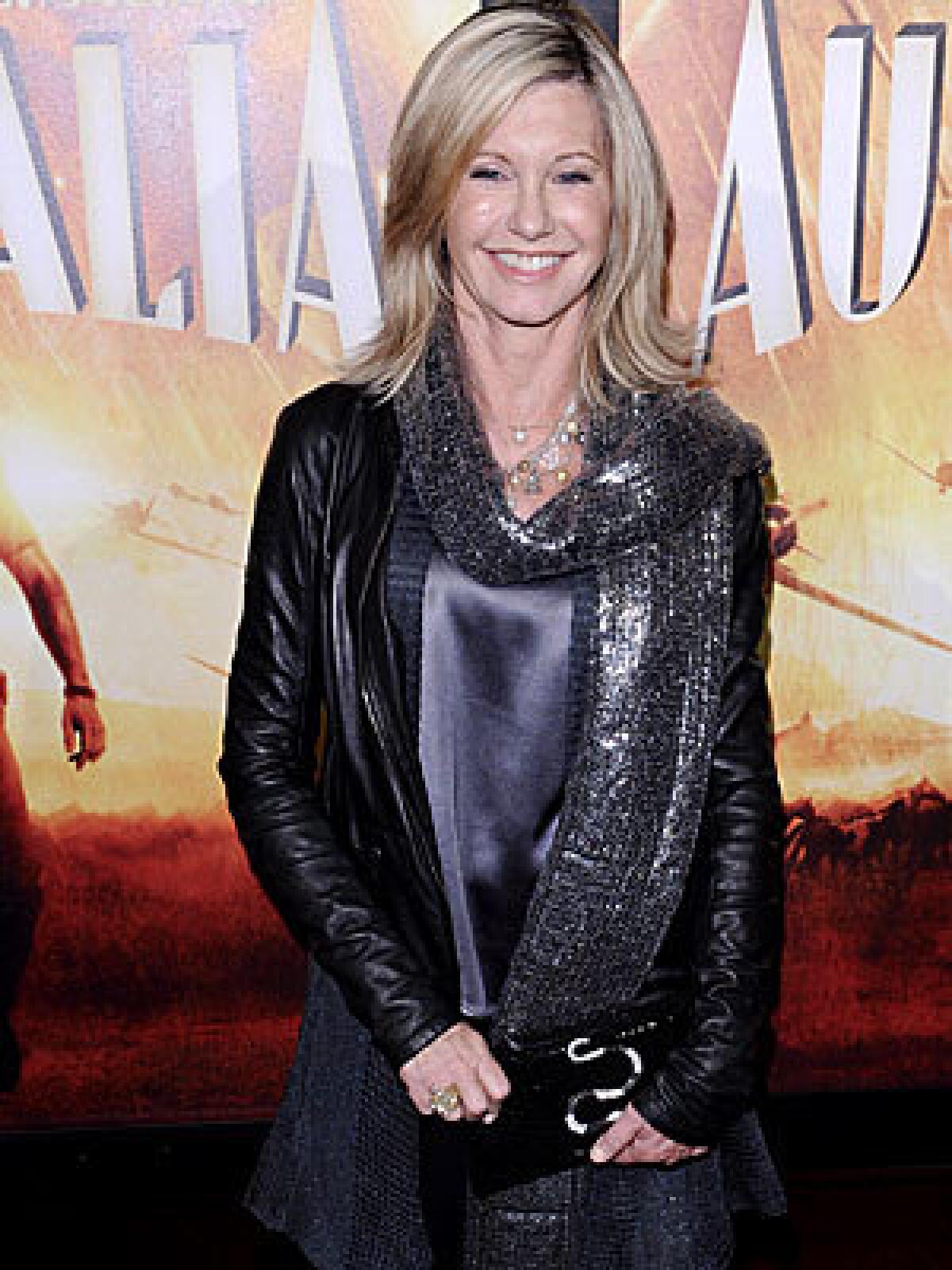 Olivia Newton-John, who withdrew her house from the market last month, just closed escrow at more than $10 million.