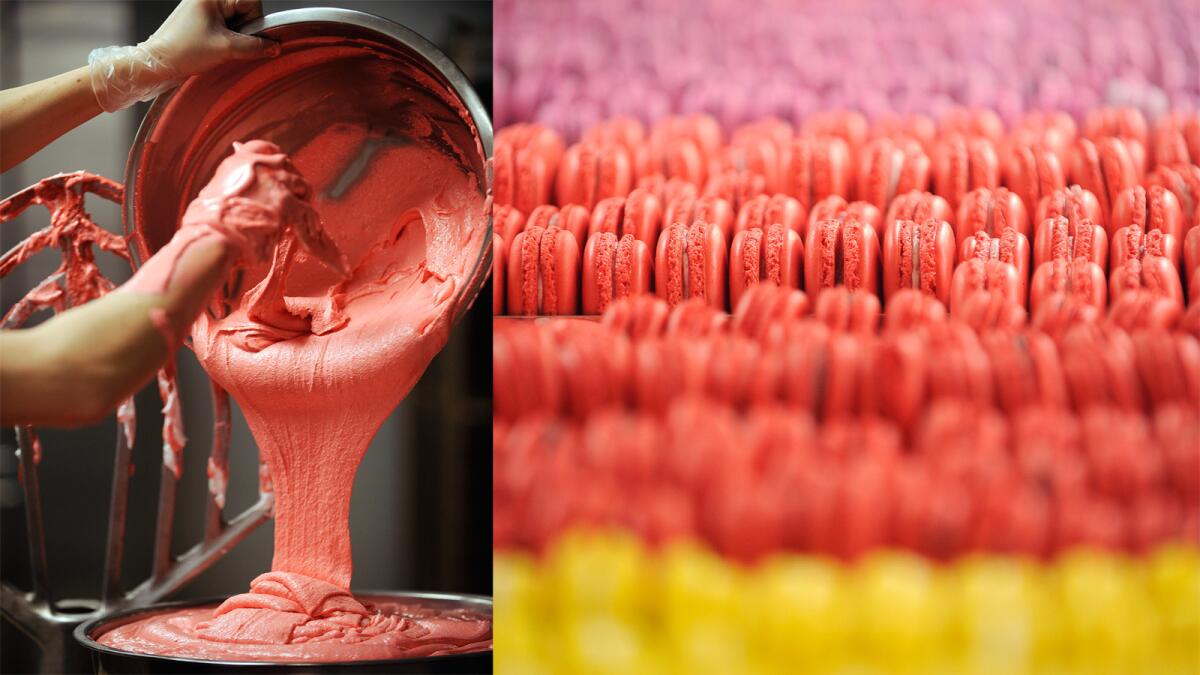 A worker, left, scoops a mix of batter, meringue, color and almond flour out of a mixing bowl for macarons at Bottega Louie's pastry kitchen in downtown Los Angeles. The finished sweets, right, are displayed in colorful rows at the restaurant.