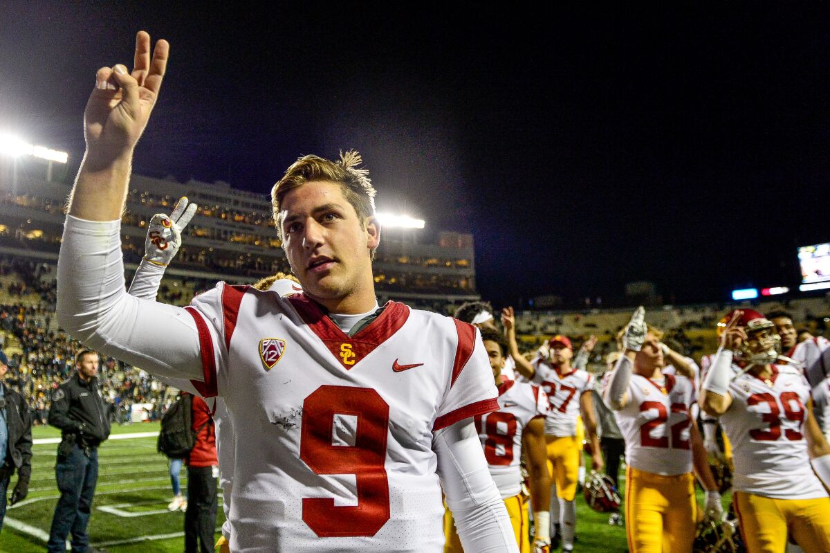 USC quarterback Kedon Slovis walks off the field after a 35-31 win over Colorado on Oct. 25 in Boulder.