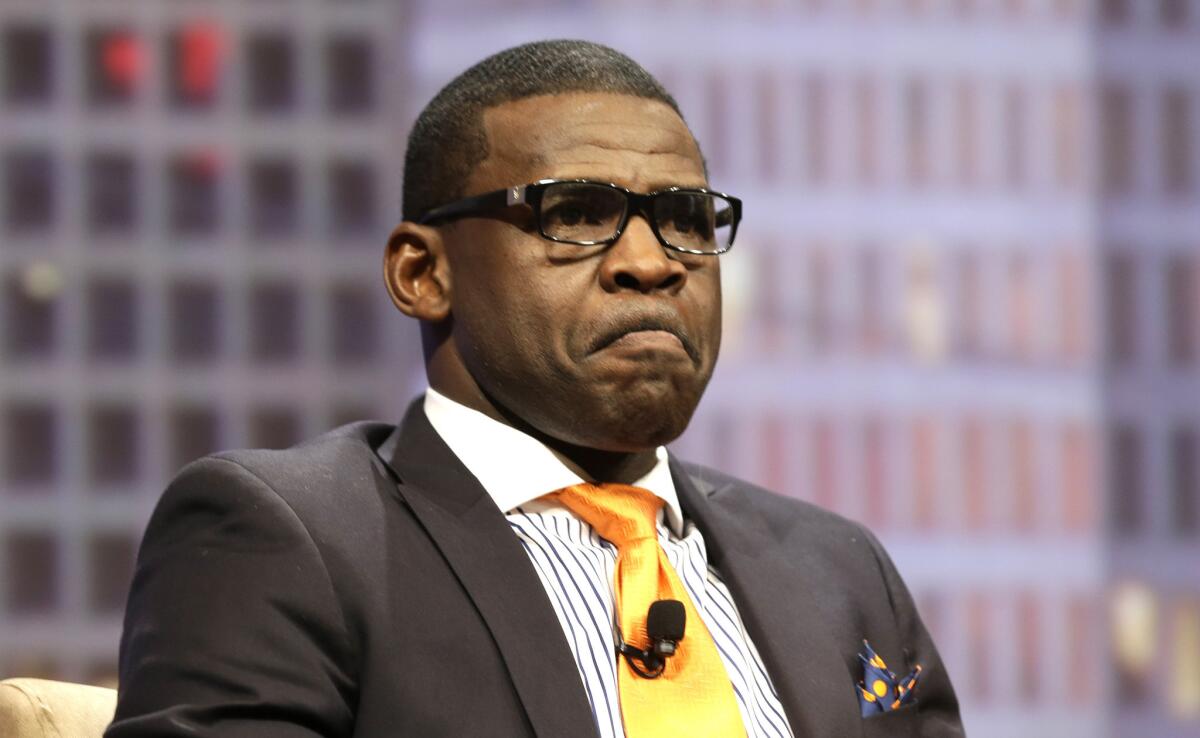 Former Dallas receiver Michael Irvin takes part in a panel discussion on June 23.