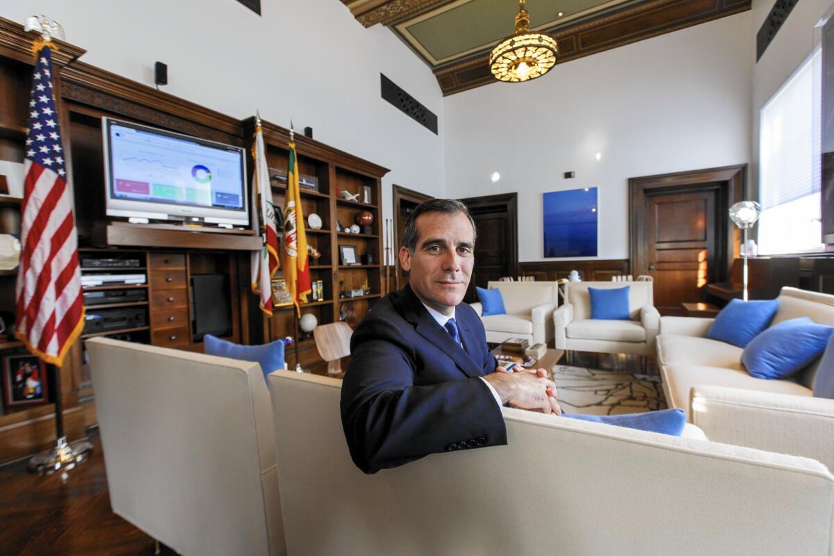 L.A. Mayor Eric Garcetti, seen in his City Hall office, says L.A. is poised to benefit as technology changes entertainment: “L.A. is where content and technology are colliding, and I don’t mean that just in the Hollywood sense of content."