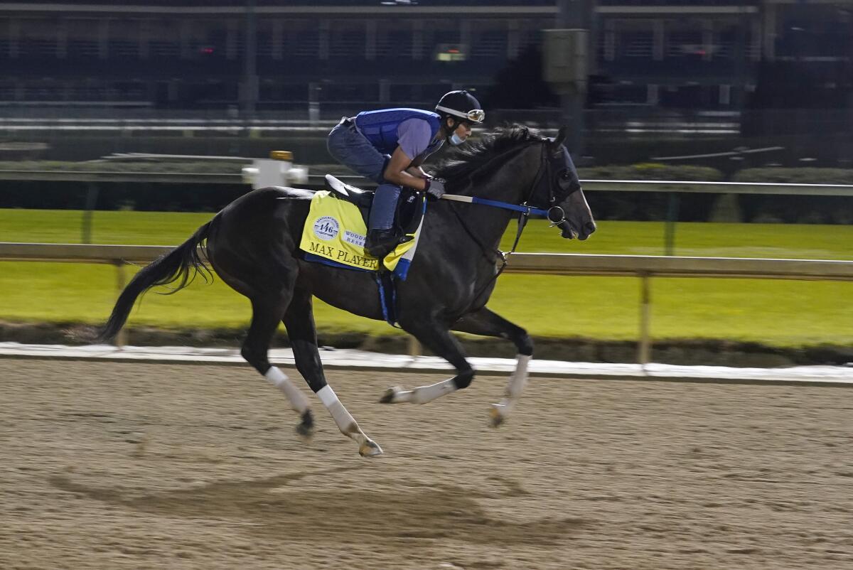 Kentucky Derby entry Max Player runs during a workout at Churchill Downs on Friday.