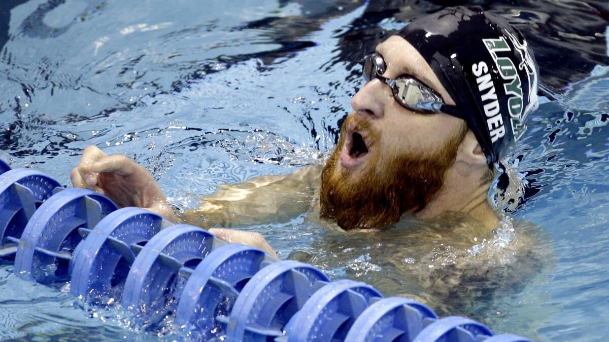 Brad Snyder takes a deep breath after a heat in the 400-meter freestyle race at the U.S. Paralympic trials June 30.