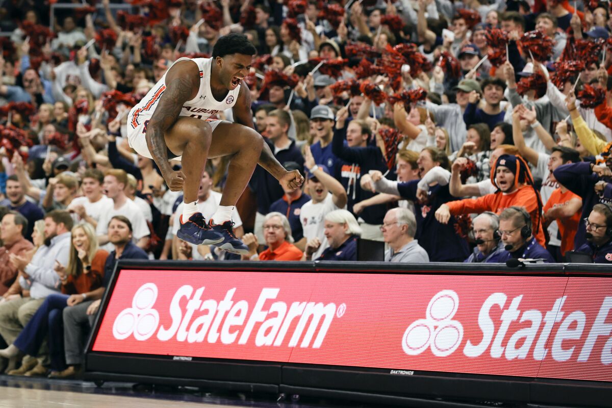 Auburn guard K.D. Johnson (0) reacts after a turnover by Central Florida during the first half of an NCAA college basketball game Wednesday, Dec. 1, 2021, in Auburn, Ala. (AP Photo/Butch Dill)