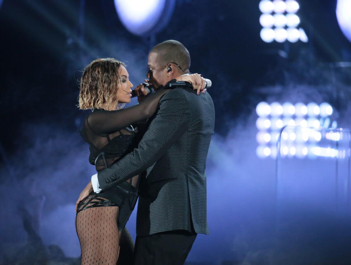 Beyonce and husband Jay Z perform at the 56th Annual Grammy Awards at Staples Center in Los Angeles.