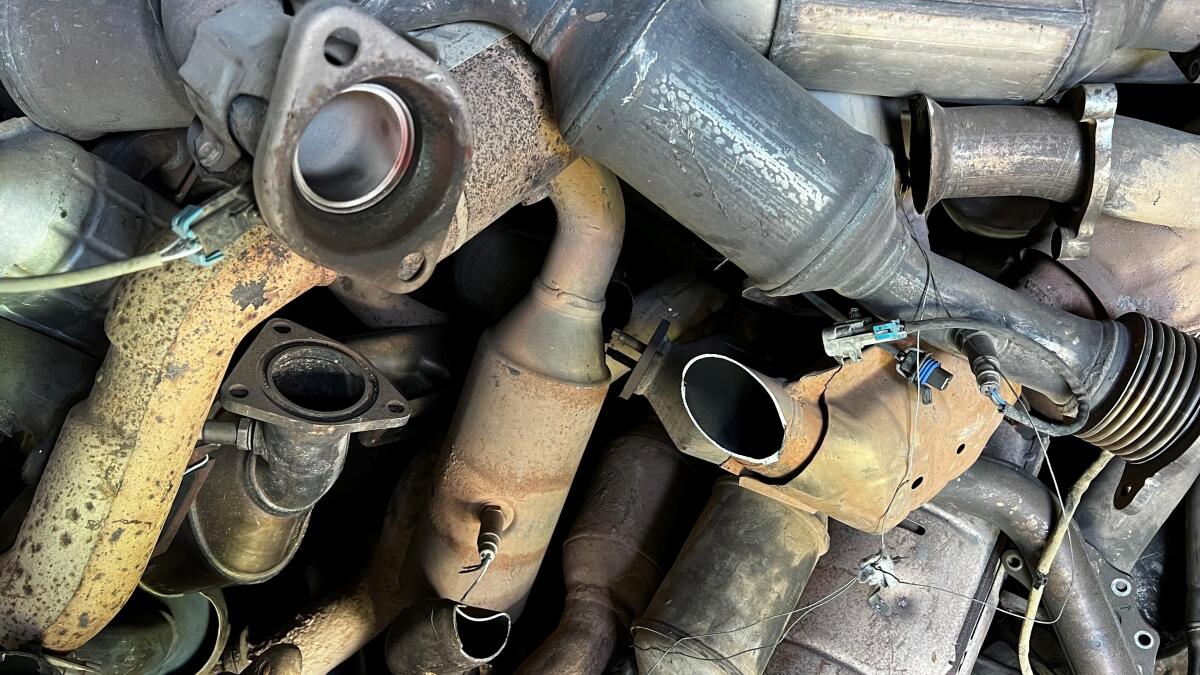 A photo provided by the Phoenix Police Department shows stolen catalytic converters that were recovered.