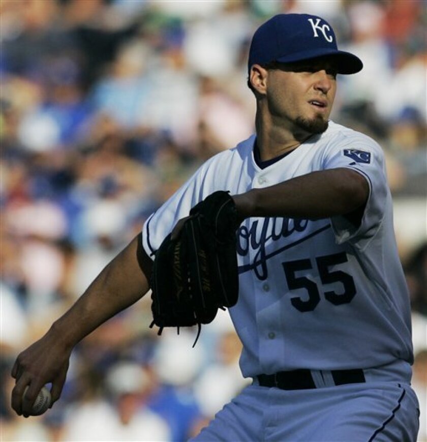 Kansas City Royals starting pitcher Gil Meche pitches to a San Francisco Giants batter during the second inning of a baseball game in Kansas City, Mo., Saturday, June 21, 2008. (AP Photo/Orlin Wagner)