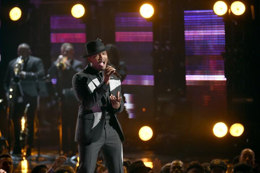 Ne-Yo performs during a tribute to Smokey Robinson at the BET Awards at the Microsoft Theater.