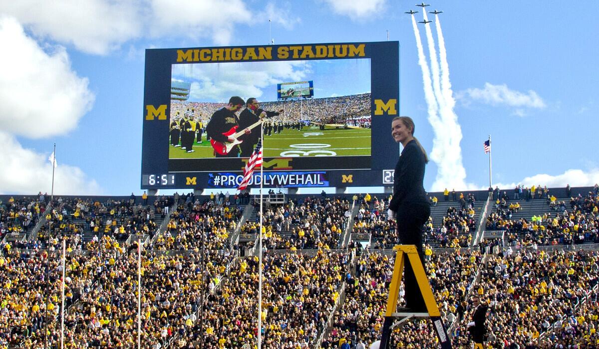 Jets fly over the Michigan Stadium last week during the halftime show.