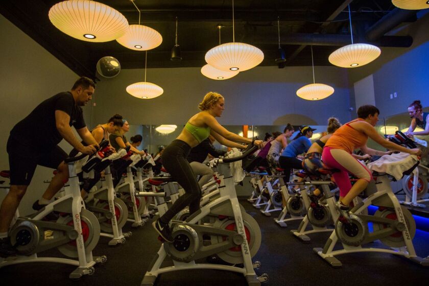 LOS ANGELES, Dec. 14, 2016 - Instructor Stacy Noelle Conner leads the EvolvRide Dec. 13, 2016 at Evolvcycle which is a new family run spinning studio in Studio City. It is quite elegant with brand new computerized Schwinn bikes, George Nelson bubble lamps, showers and eucalyptus towels after class. Get a wide variety of pictures of the class, details, the space(Barbara Davidson/Los Angeles Times)