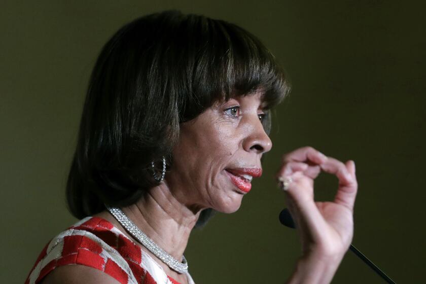 FILE - In this Dec. 6, 2016 file photo, Baltimore Mayor Catherine Pugh delivers an address during her inauguration ceremony inside the War Memorial Building in Baltimore. The disgraced former mayor of Baltimore was charged Wednesday, Nov. 20, 2019, with fraud and tax evasion involving sales of her self-published children's books. An 11-count federal indictment accuses Pugh of using her “Healthy Holly” children’s books to enrich herself, promote her political career and fund her run for mayor. (AP Photo/Patrick Semansky, File)