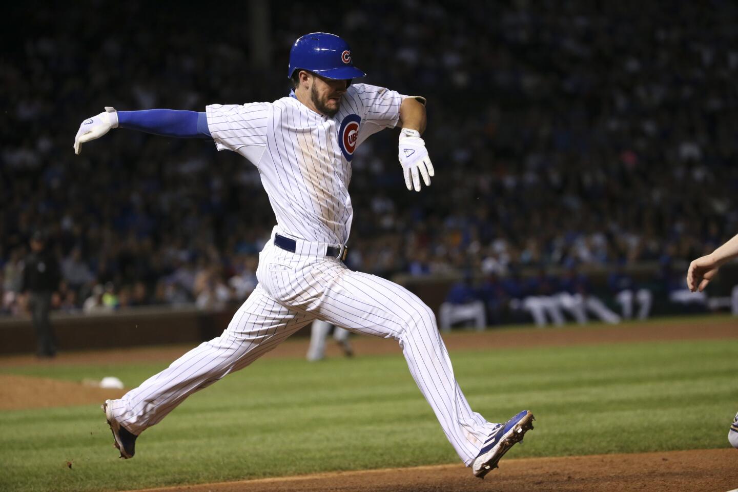 Kris Bryant is out at first in the ninth inning.