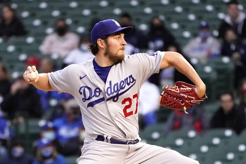 Dodgers starting pitcher Trevor Bauer delivers.