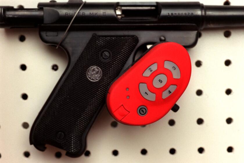 Department of Natural Resources gun safety program including an air gun shooting range at the State Fair. -- Part of the trigger lock display for revolvers and semi-automatics. This is a trigger lock for a semi-automatic.(Photo By JOEY MCLEISTER/Star Tribune via Getty Images)