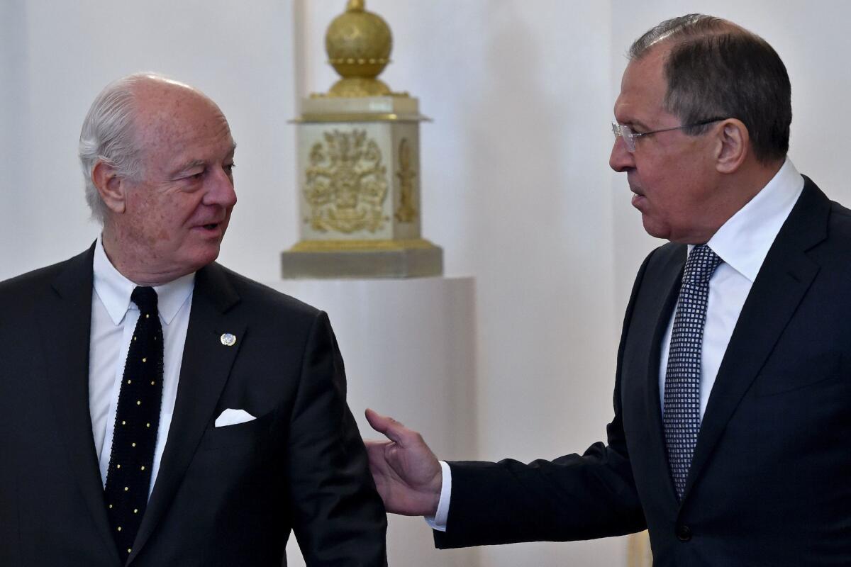 Russian Foreign Minister Sergei Lavrov, right, meets with United Nations envoy for Syria Staffan de Mistura in Moscow on May 3.
