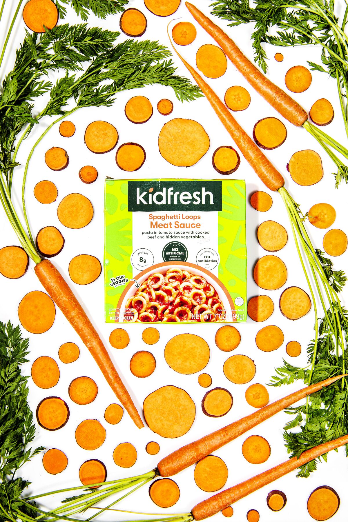 A package of Kidfresh Spaghetti Loops with sliced sweet potatoes and whole carrots