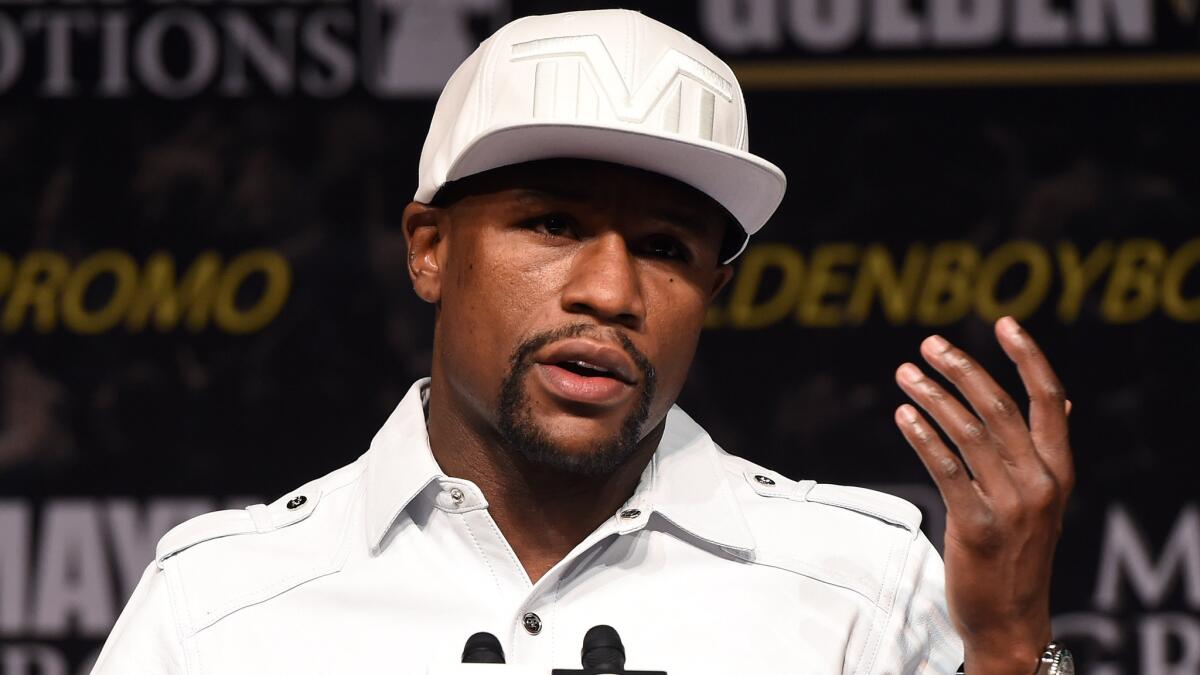 Floyd Mayweather speaks during a news conference in Las Vegas on Wednesday to promote his title bout against Marcos Maidana on Saturday.