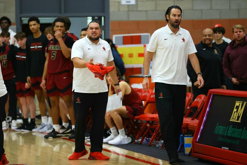 JSerra coach Keith Wilkinson (right) received a six-game suspension from the Southern Section 