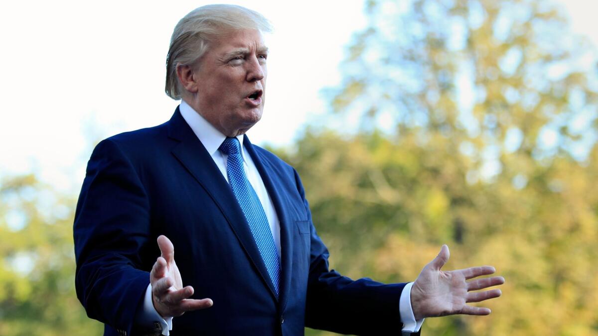 President Trump speaks to reporters upon his return to the White House on Sept. 24, 2017.