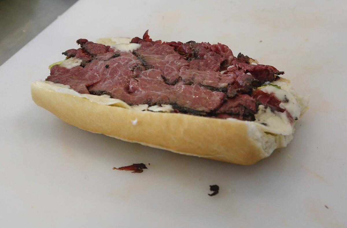 The popular Hot Pickler pastrami sandwich with melted provolone.
