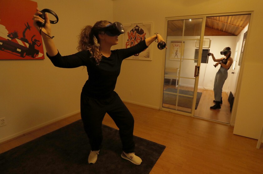 Dasha Kittredge, left, and Haylee Nichele are actors for Tender Claws, an experimental game studio that makes virtual and augmented reality games. 