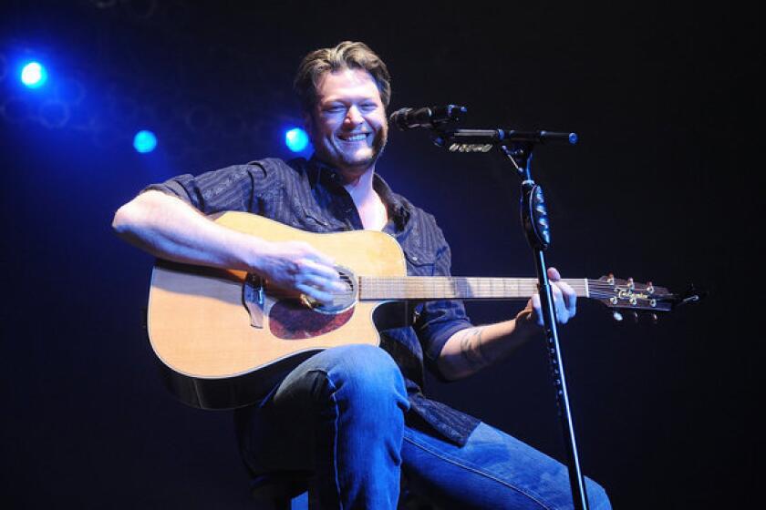 Blake Shelton's new album arrives the same week he rejoined "The Voice" for the singing show's fourth season on NBC.