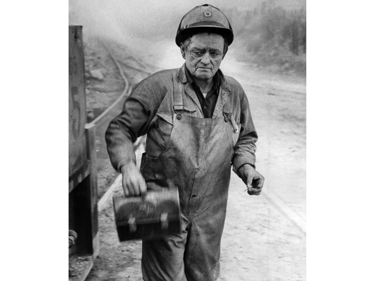 June 24, 1971: Paul "Dutch" Badgley, 63, leaves site of explosion at Sylmar tunnel where he used a rail car to rescue one victim.