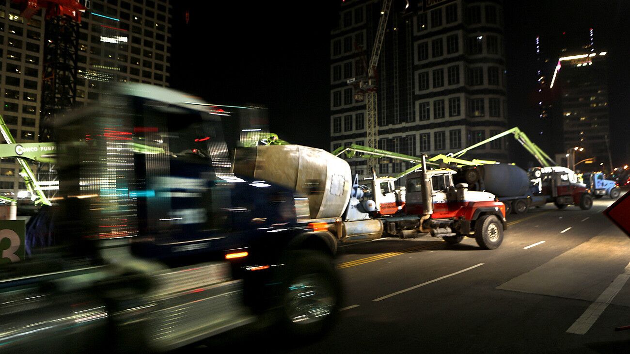 Another concrete truck arrives at the New Wilshire Grand construction site. The record-setting pour required 2,100 truckloads delivering 21,200 cubic yards of concrete weighing 82 million pounds.