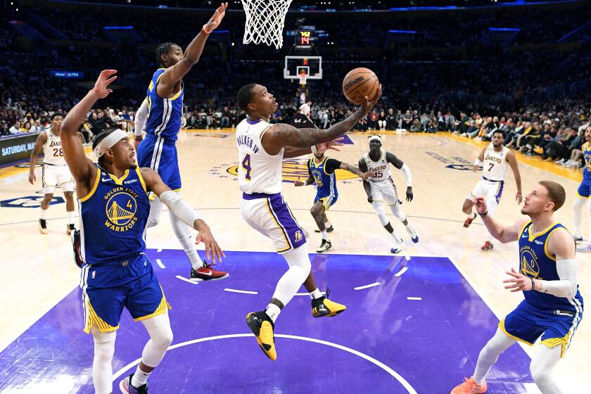 Los Angeles, California May 6, 2023-Lakers Lonnie Walker beats the Warriors defense in the fourth quarter in Game 3 of the Western Conference semifinal at Crypto.com arena Saturday. (Wally Skalij/Los Angeles Times)