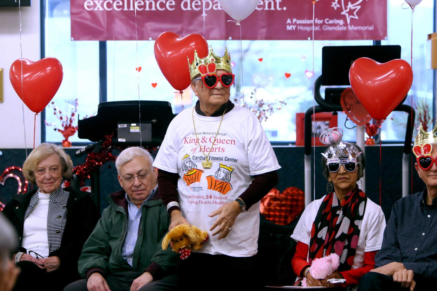 Wadhu Bhojwani, standing, was crowned Senior King at the 24th annual King and Queen of Hearts event, at the Cardiac Fitness Center, at Dignity Health Glendale Memorial Hospital and Health Center, on Thursday, Feb. 14, 2019.