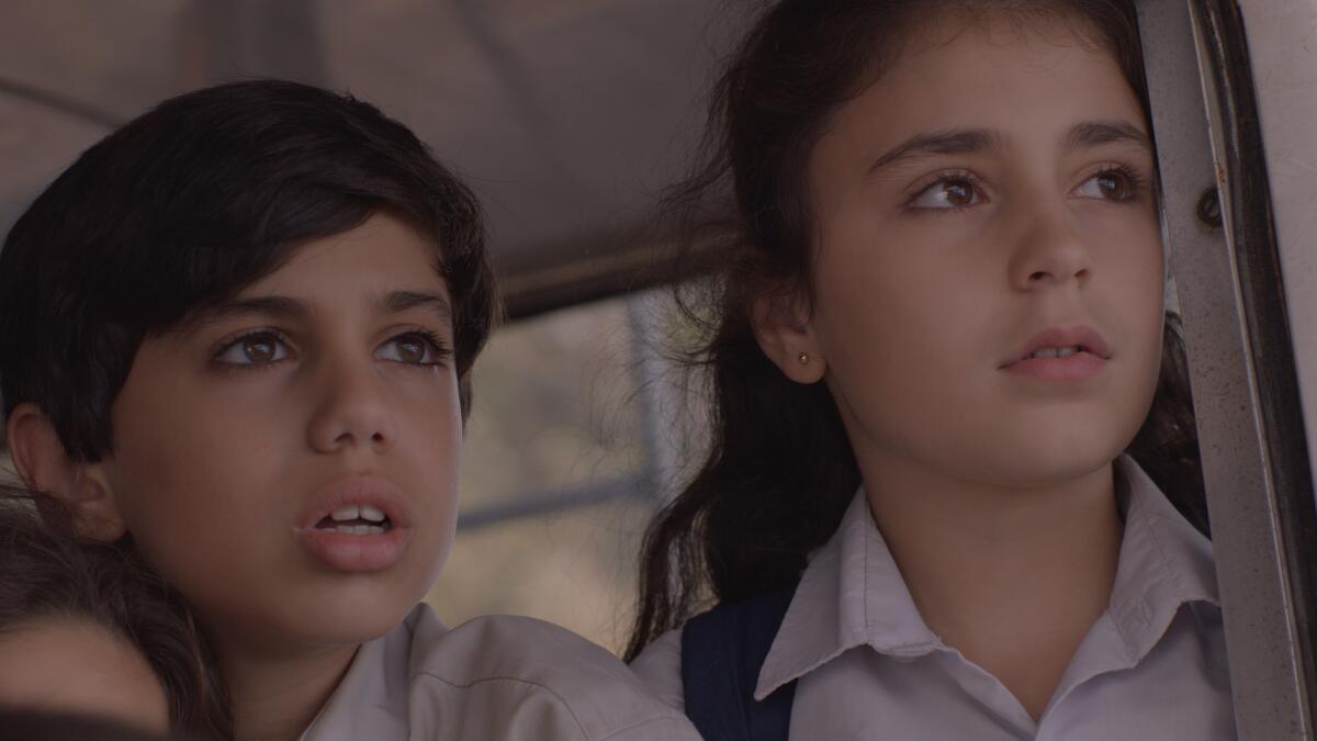 Mohamad Dalli as Wissam and Gia Madi as Joana in "1982."